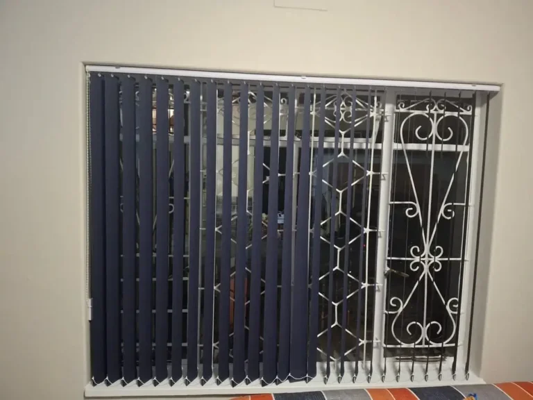 vertical 90mm blind charcoal in lounge