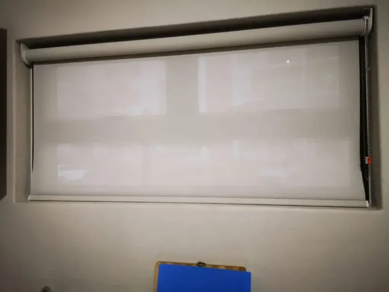 light filtering roller blind white bedroom
