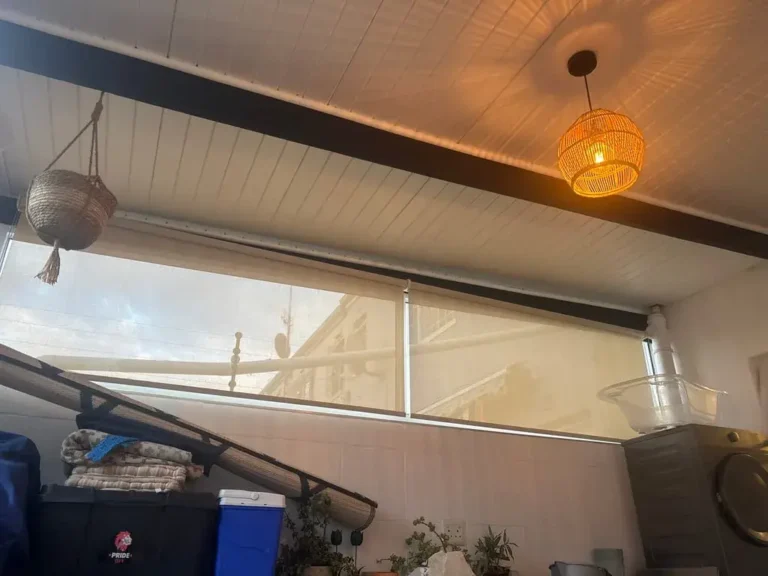 light filtering roller blind linen in storage room